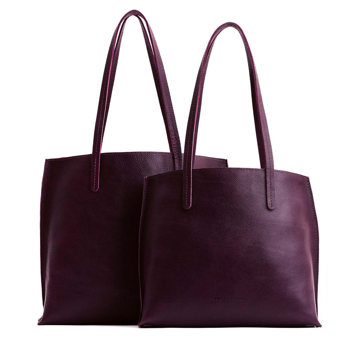 Plum | Side by side comparison of both sizes of leather totes