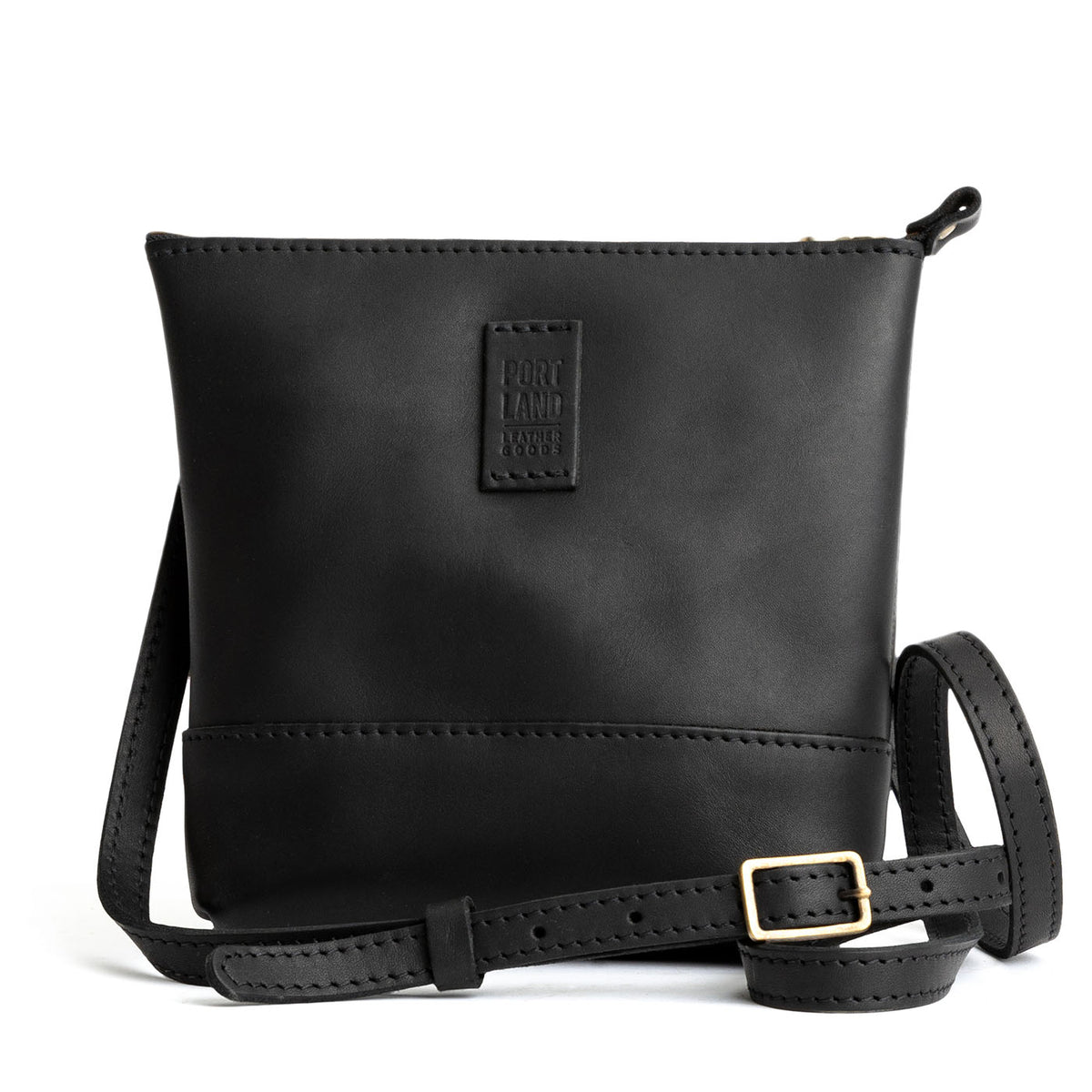 Black | Small rectangular crossbody purse with top zipper and interior pocket