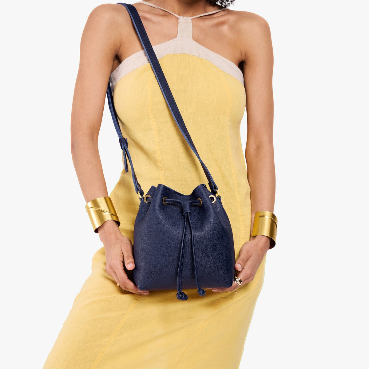 Cobalt*Small | Model wearing slouchy crossbody bag with drawstring closure