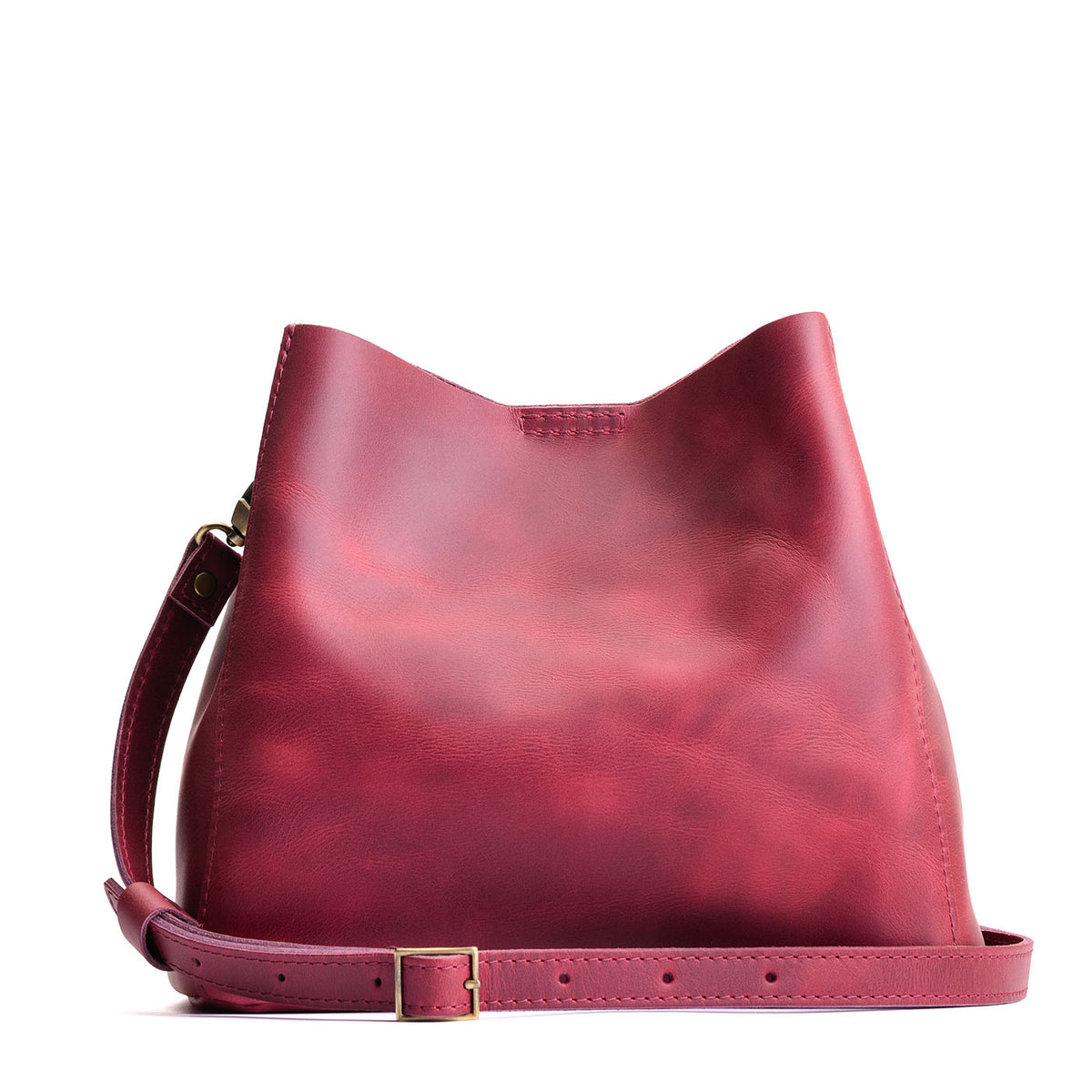 Anemone | symmetrical bucket bag with latch closure and removable crossbody strap