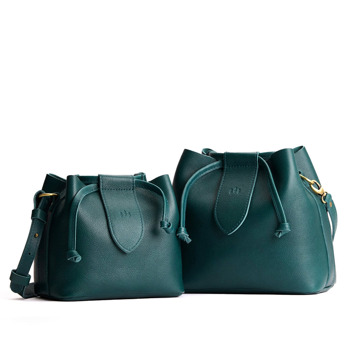 Sea Glass | Small and large symmetrical leather bags with leather drawstring closure and adjustable shoulder strap