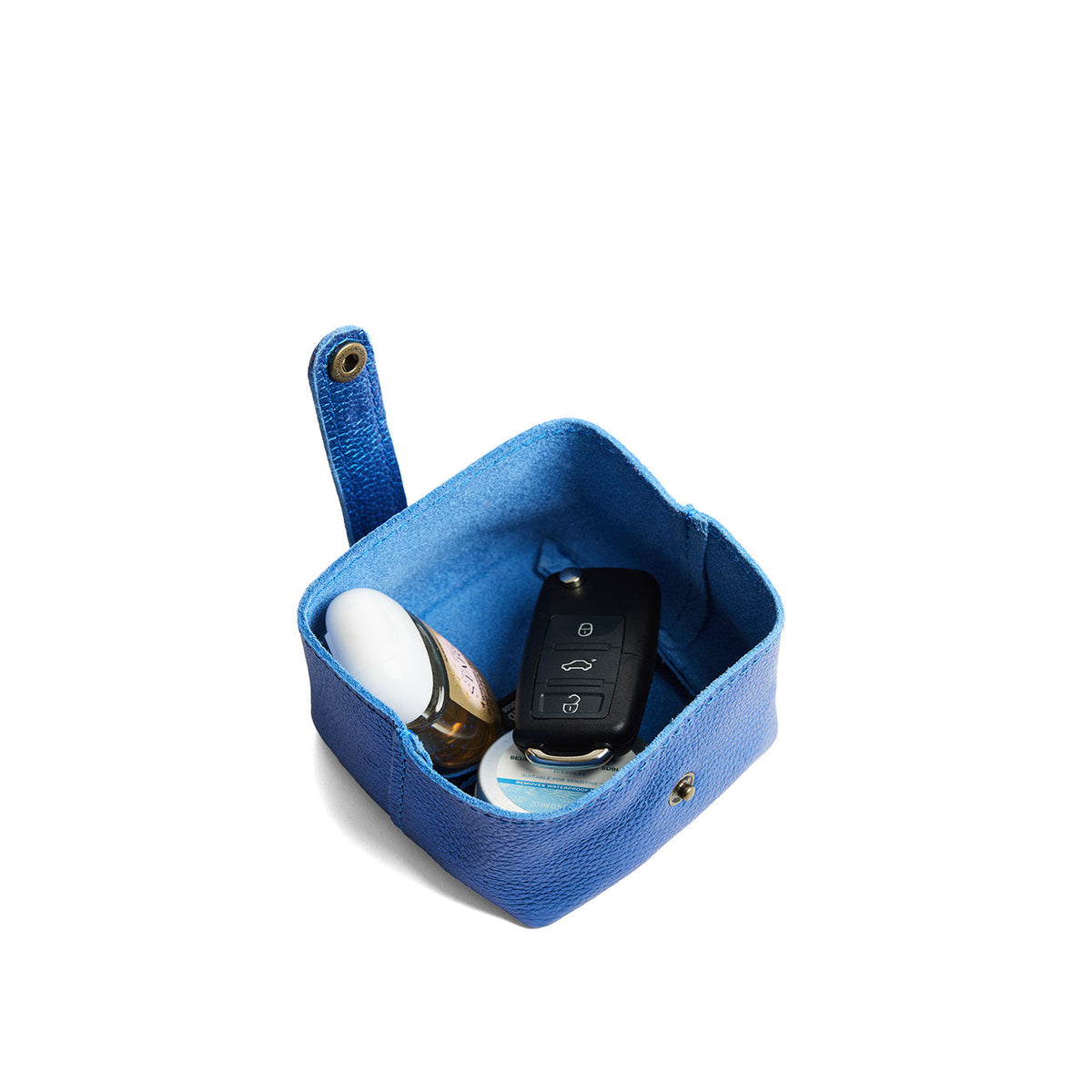 Comet Blue | Foldable square leather pouch with snap closure open