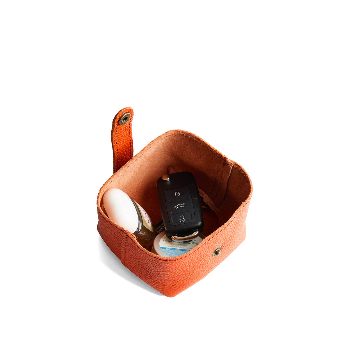 Koi | Foldable square leather pouch with snap closure open