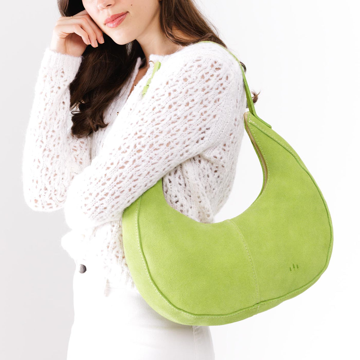 Lime*Large | Crescent shaped shoulder bag with zipper closure and adjustable strap