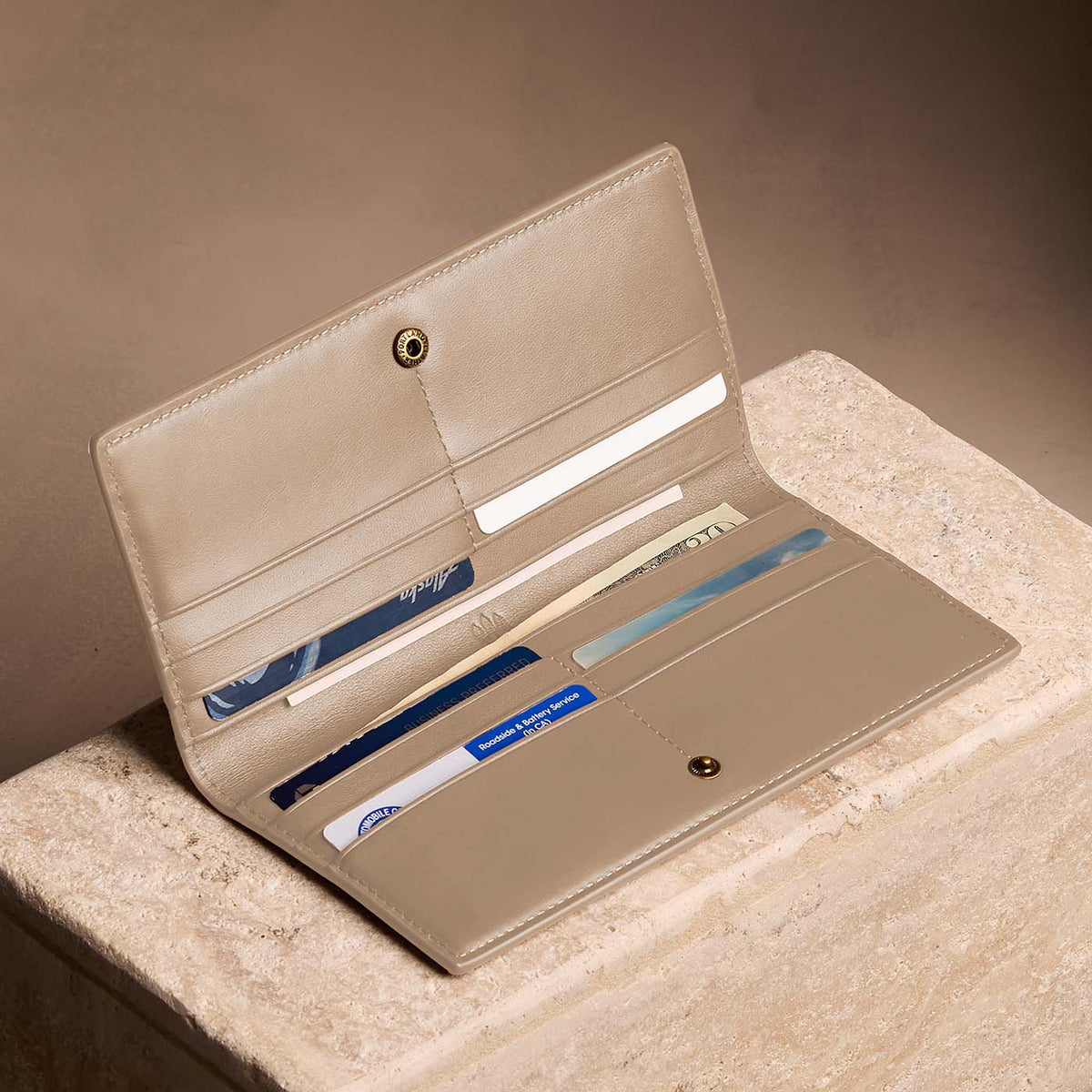 Satine*Large | Slim leather bifold wallet with multiple card slots and a zippered back pocket