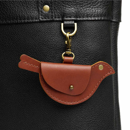 Honey | Bird shaped pouch with button closure and lobster clasp