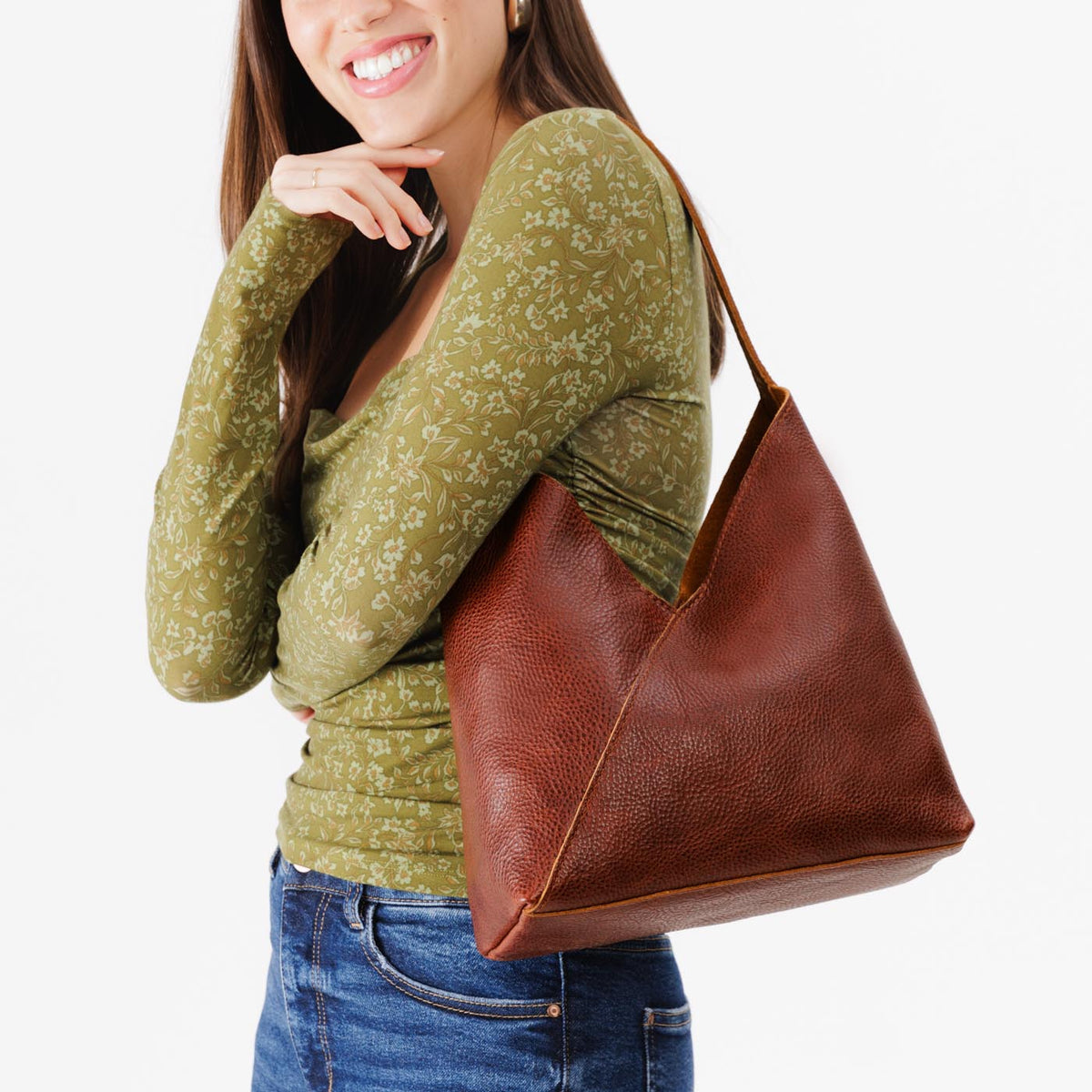 Nutmeg*Large | Model wearing mid-size shoulder bag with magnetic snap closure