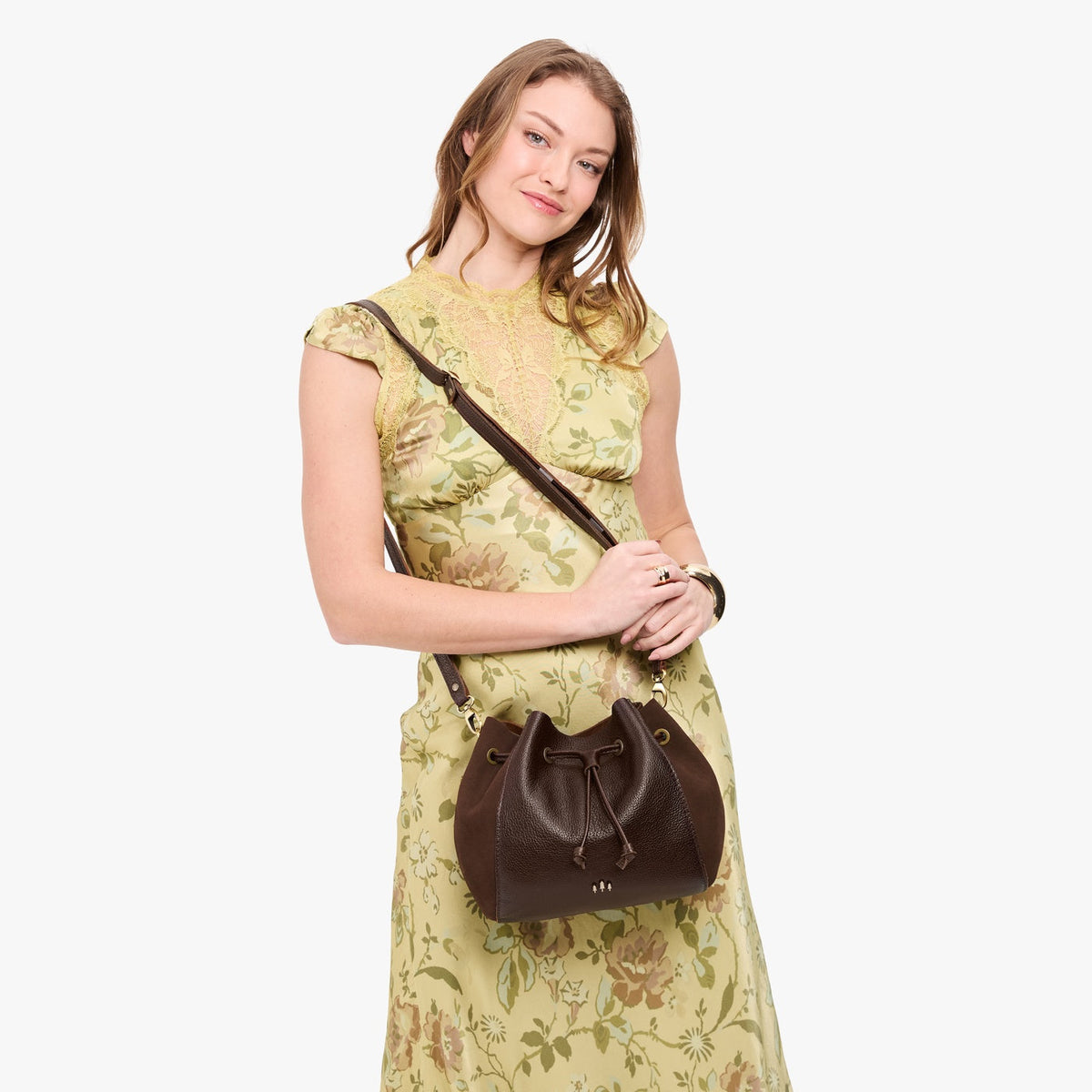 Coldbrew | Model wearing bucket bag with cinched drawstring closure