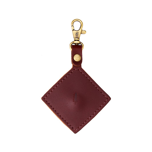 Cognac | Diamond shaped leather AirTag holder on a lobster clasp keychain