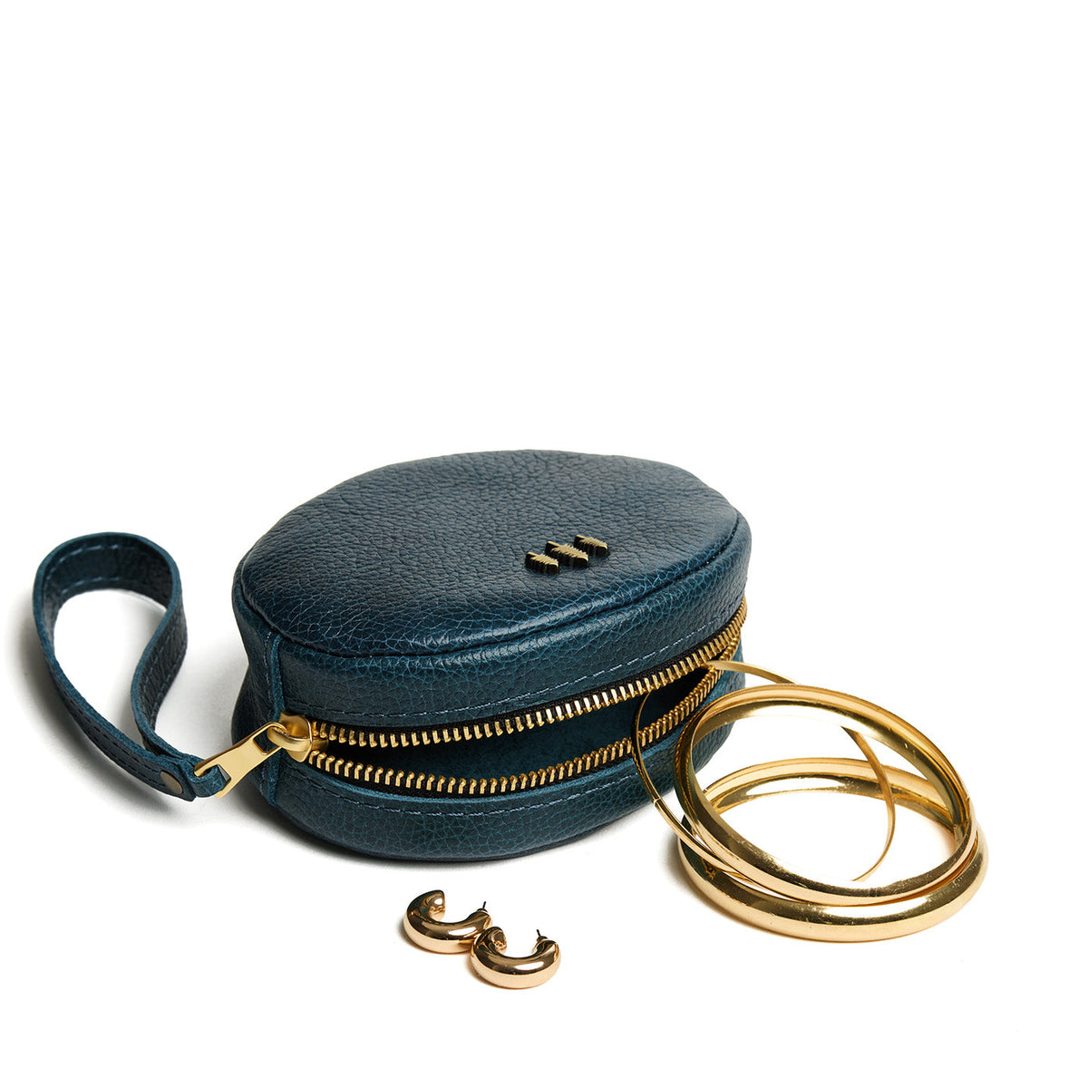 Lagoon*Small | Oval shaped pouches with zipper and wristlet strap open with accessories