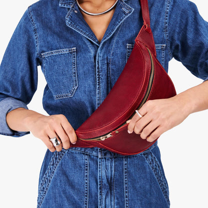 Chili Red | Model wearing a sling bag with front zipper