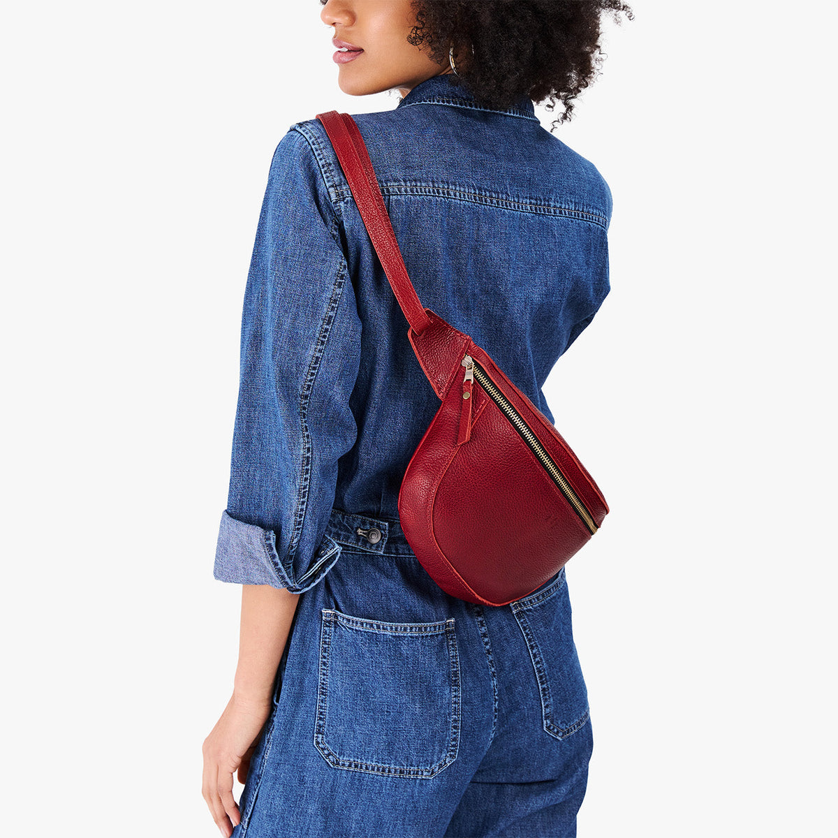 Chili Red | Model wearing a sling bag with front zipper