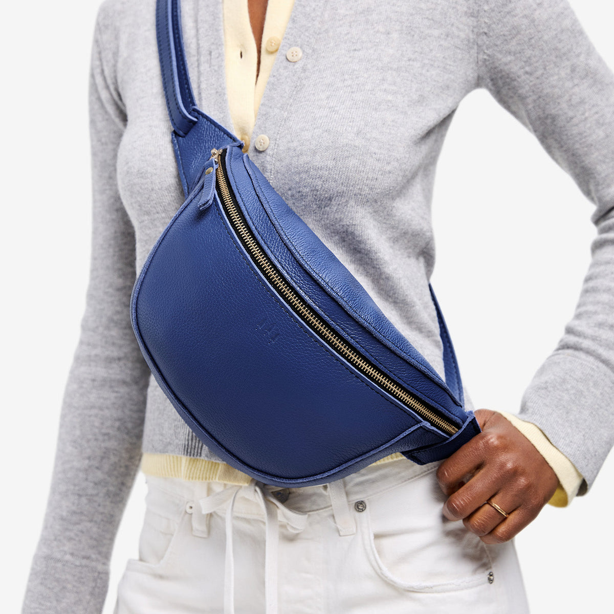 Molino Blue | Model wearing a sling bag with front zipper