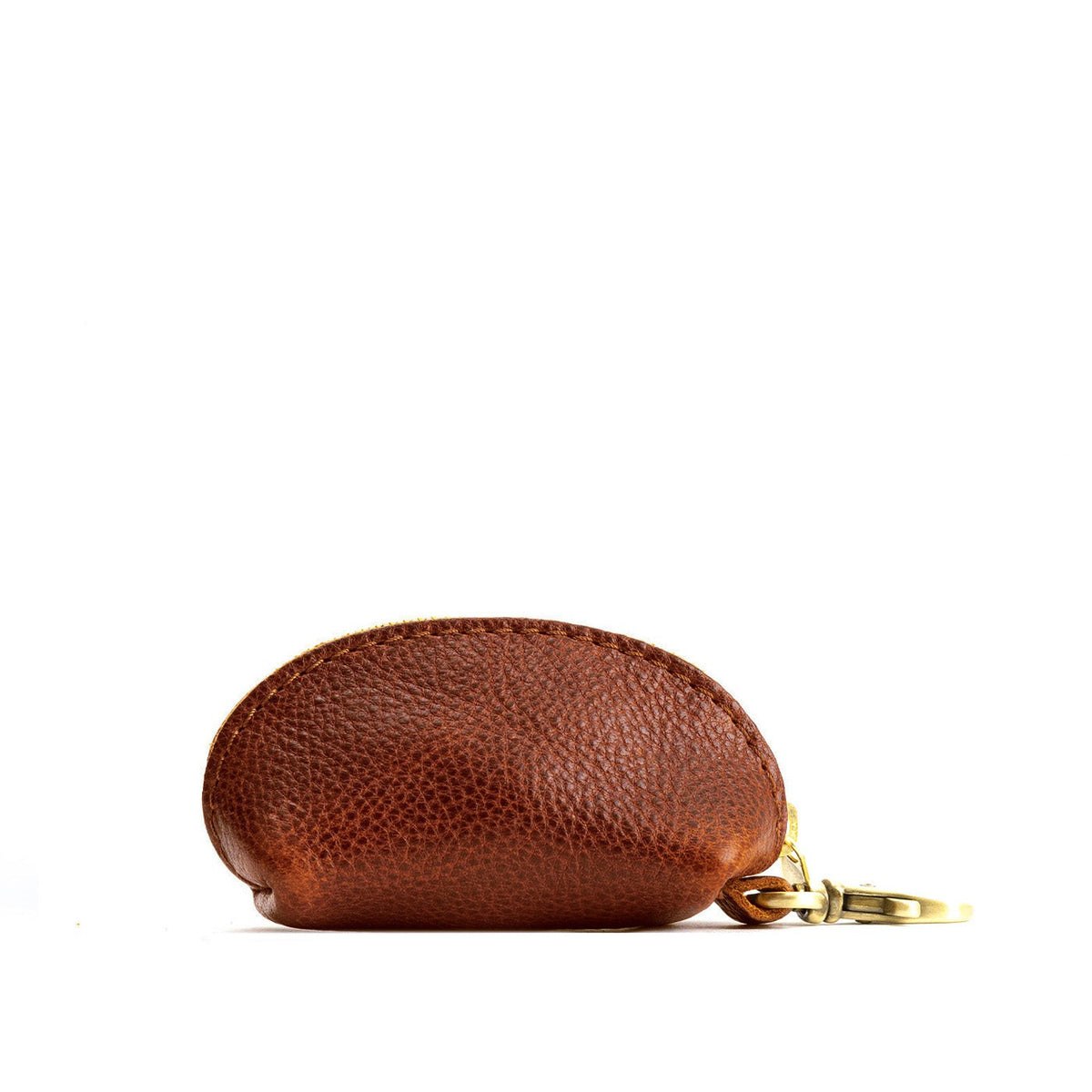 Nutmeg | Taco shaped leather pouch with zipper and swivel lobster clasp on white background