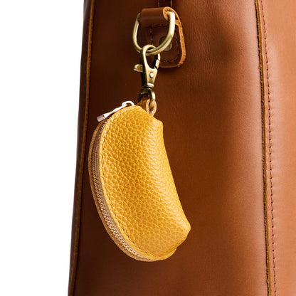 Sunshine | Taco shaped leather pouch with zipper and swivel lobster clasp on bag