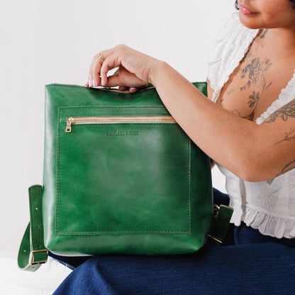 All Color: Cowboy Mint*Classic | Model holding square slim leather tote backpack