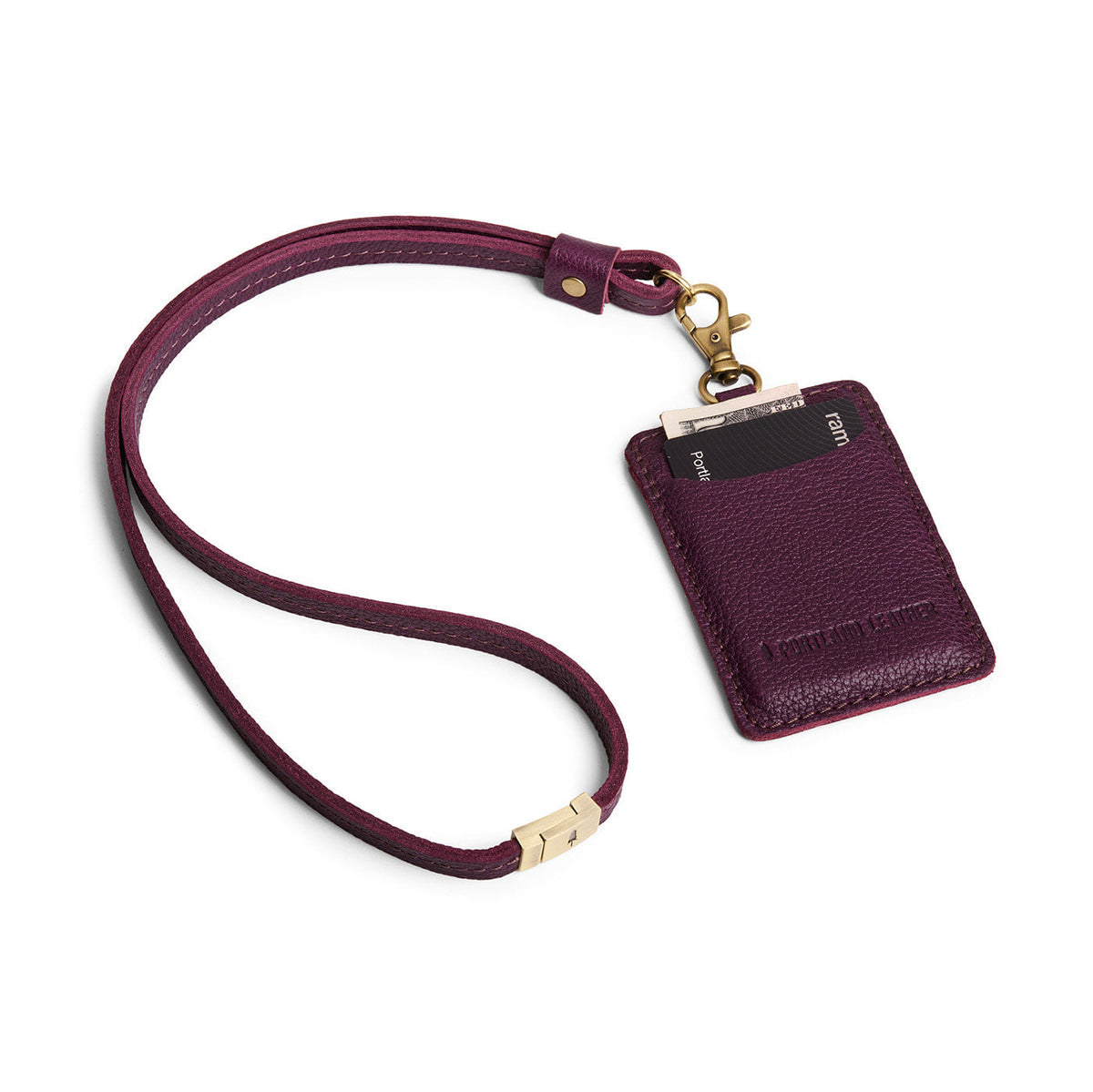 Plum | A leather lanyard attached to a matching card holder on a white background