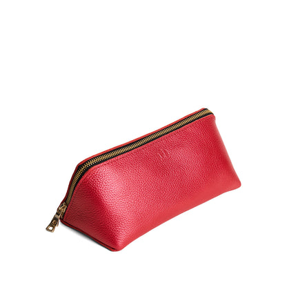 Reba Red | Triangular shaped pouch with extra long zipper
