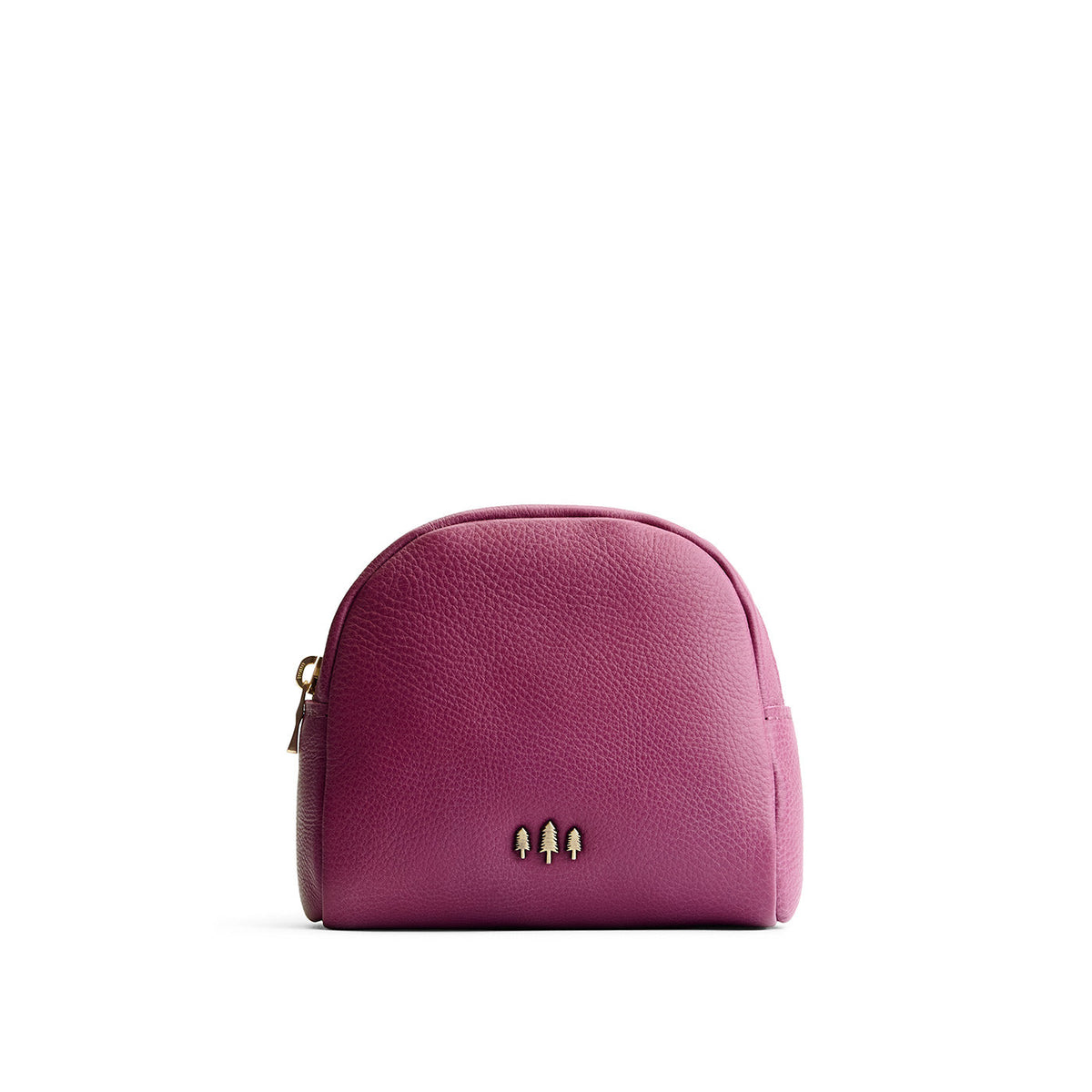 Iris | Curved top leather pouch with zipper opening, flat base, and three metal tree emblems in front