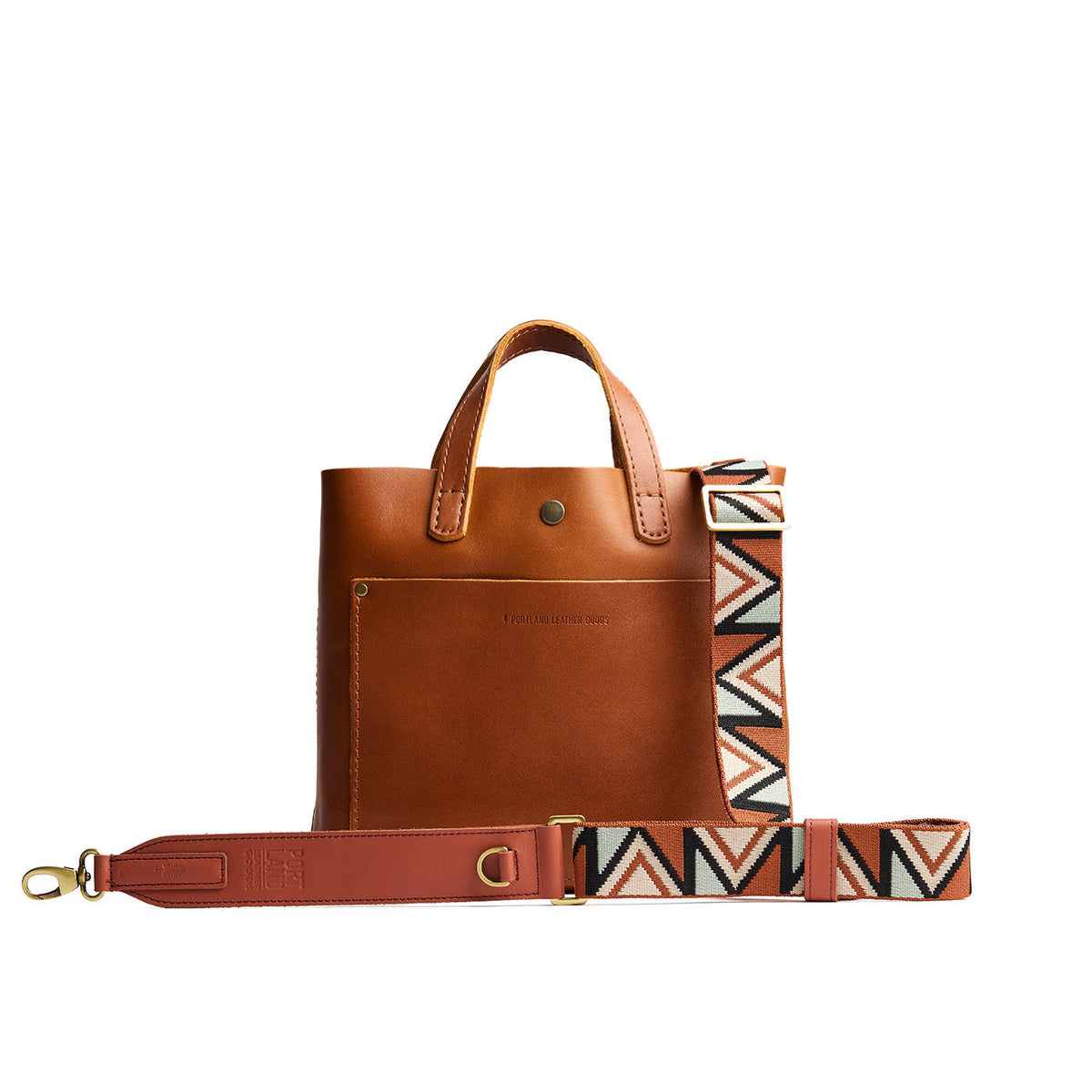 Terramint | Adjustable fabric and leather strap with zig zag pattern on a leather tote bag